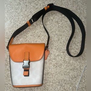 ORANGE COACH UNISEX BAG. NEW AND CLEAN.